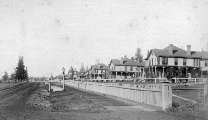 #31 A view of Officer’s Row at the Vancouver Barracks looking west with the houses on the right, 1909