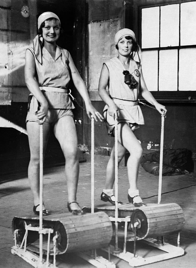 Two members of the ‘Foster-Girls’ on treadmills, 1930