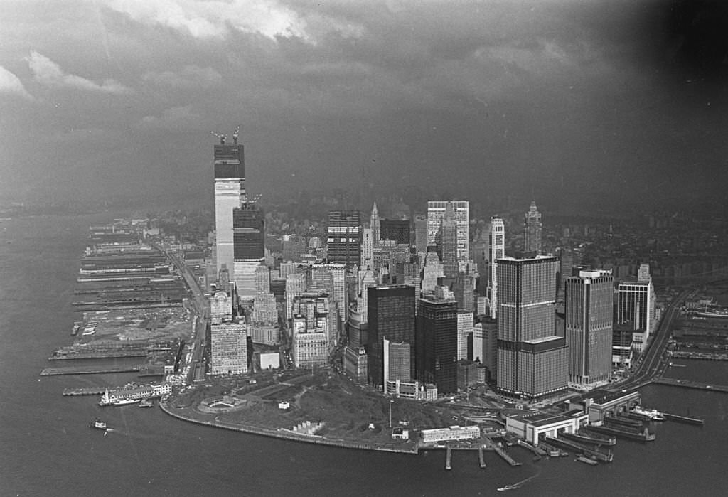 #13 Storm clouds over the New York skyline, where the World Trade Center (World Trade Centre) is under construction, 1971