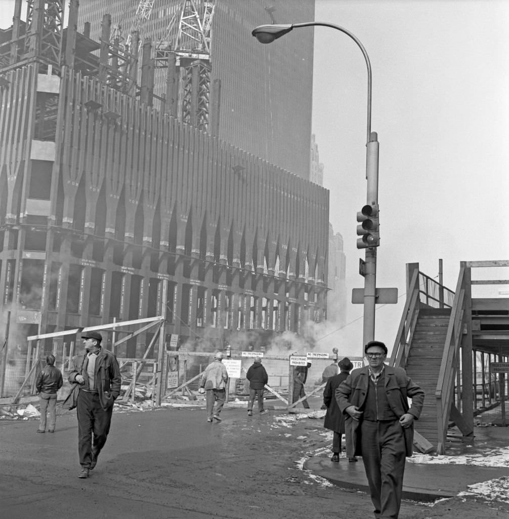 #34 Workers enter and leave the World Trade Center construction site in Downtown Manhattan during the Winter of 1970