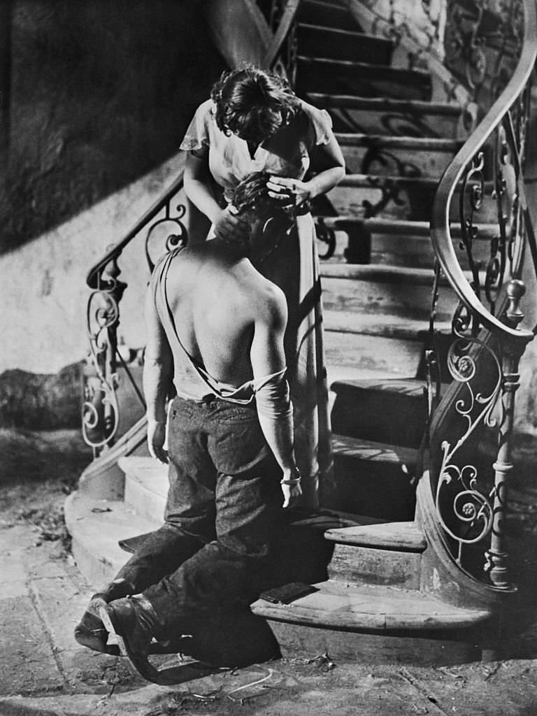 Marlon Brando and Kim Hunter share a scene in the film ‘A Streetcar Named Desire’