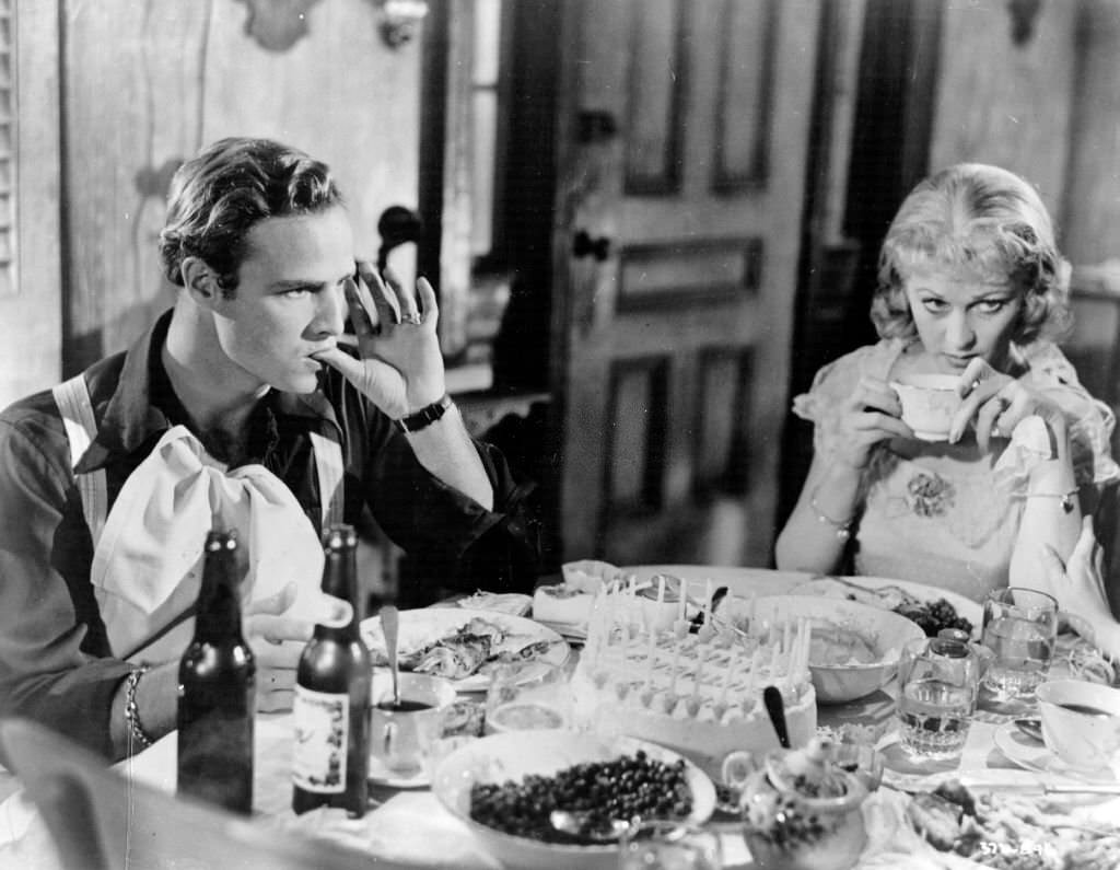 American actor Marlon Brando and Vivien Leigh celebrate a tense birthday as Stanley Kowalski and Blanche DuBois in ‘A Streetcar Named Desire’.