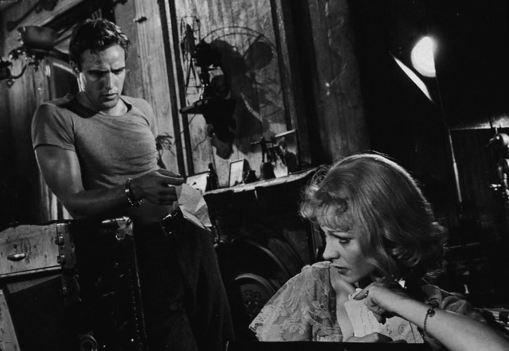 Actor Marlon Brando hands a tissue to Vivien Leigh in a still from the film, ‘A Streetcar Named Desire’, 1951.