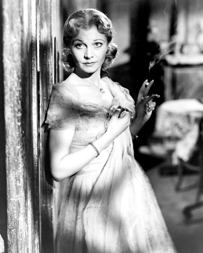 Vivien Leigh holding a lit cigarette in a publicity still issued for the film, ‘A Streetcar Named Desire’, 1951.