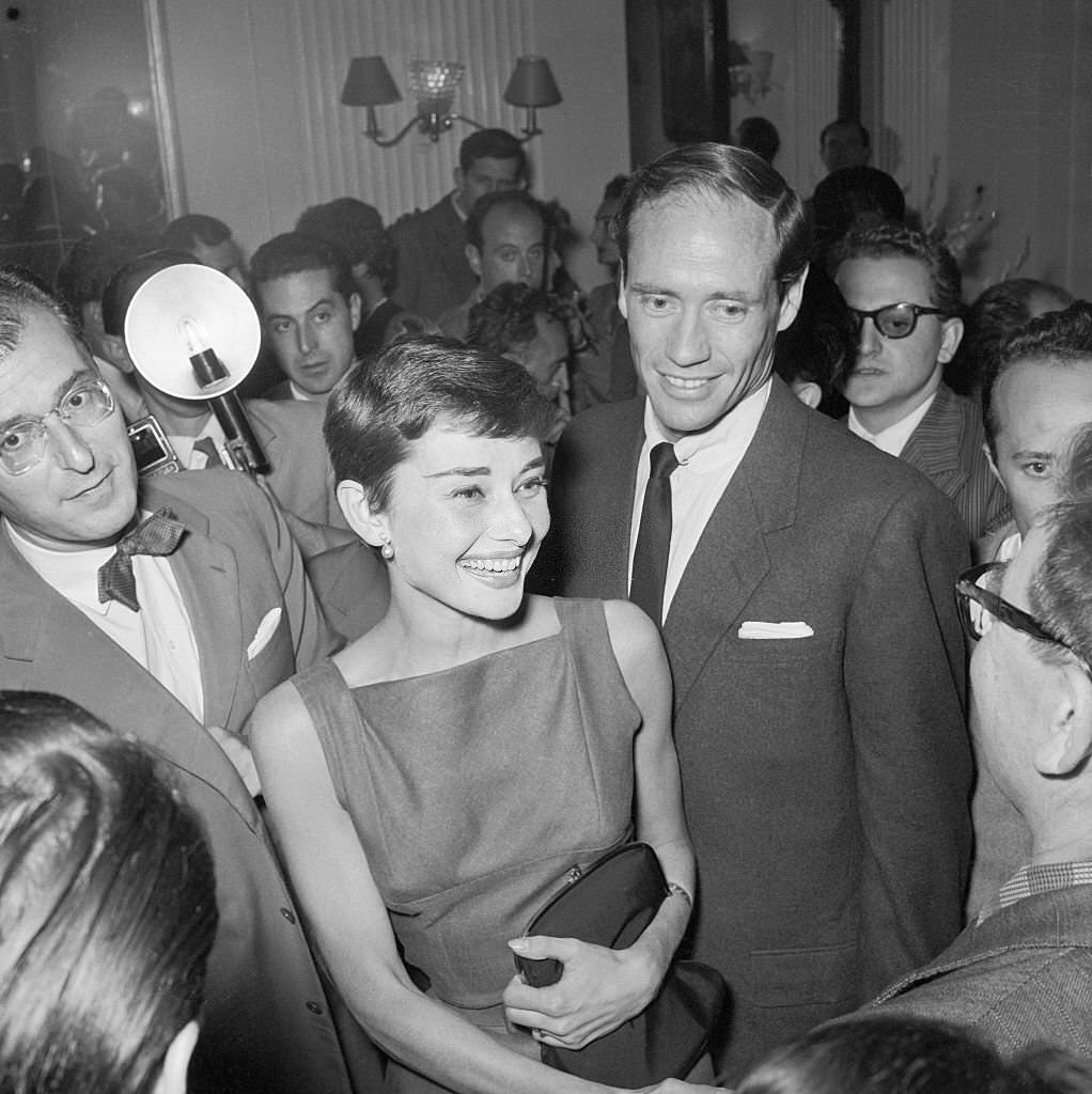 #38 Audrey Hepburn and Mel Ferrer Speaking to Journalists
