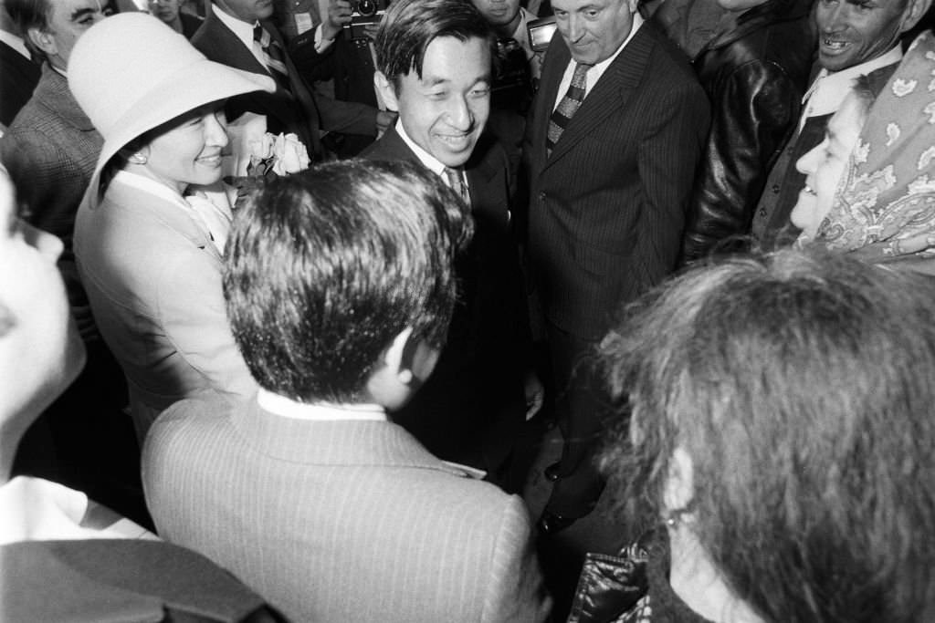 #74 Crown Prince Akihito and Crown Princess Michiko visit a market on October 10, 1979 in Bucharest.