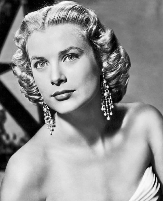 #32 Grace Kelly from ‘Dial M For Murder’ by Bert Six, 1954