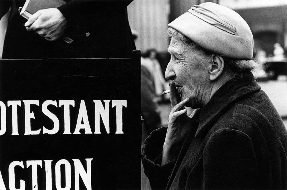 #26 A lady with umbrella at Dunferm line, Edinburgh, 1965