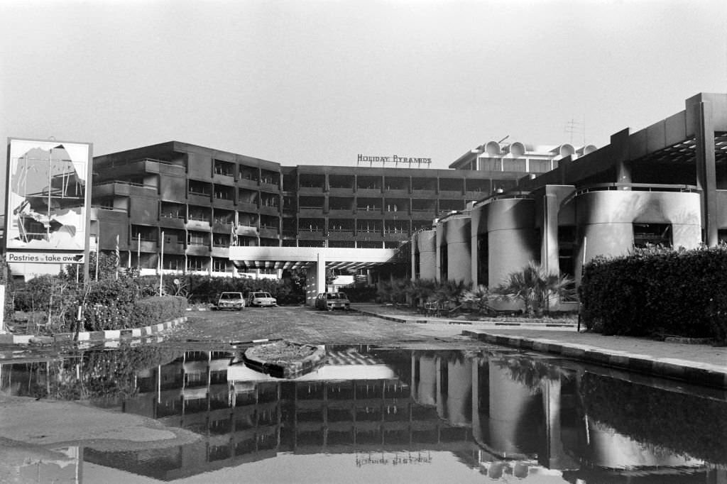 #11 The remains of a burned Hotel in Cairo after factions in the Egyptian military police started fighting between one another in protest of the Egyptian governement’s decision, 1980s