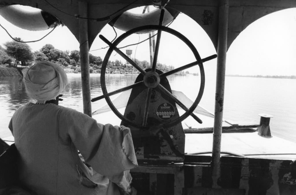 #18 A boat sails on the Nile in 1984.