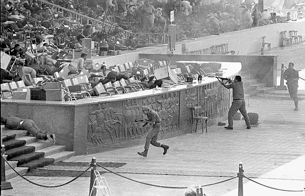 #34 Egyptian soldiers fire on Egyptian President Anwar Al-Sadat while reviewing a military parade in honor.