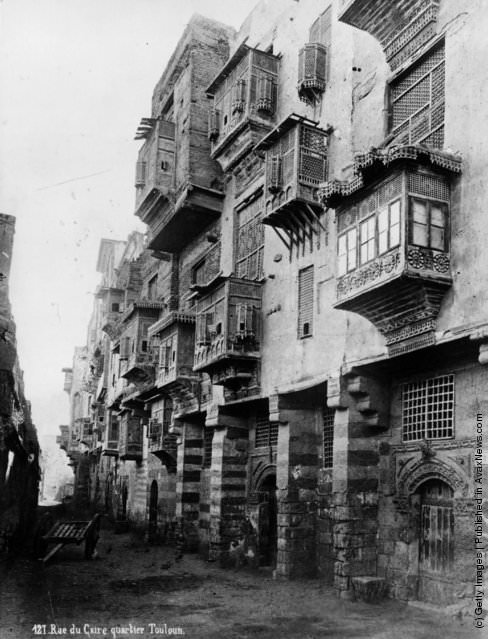 #137 Old buildings in the Touloun quarter of Cairo. Examples of highly decorated “mashrubiyeh” windows, 1880
