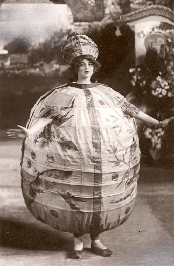 #17 Gabrielle Ray wearing a winged costume in a publicity photo for a production of ‘Little Cherub’.