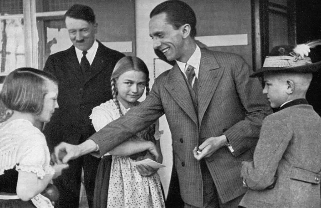 #41 Joseph Goebbels in conversation with children in front of Haus Wachenfeld on the Obersalzberg Berchtesgaden, 1933