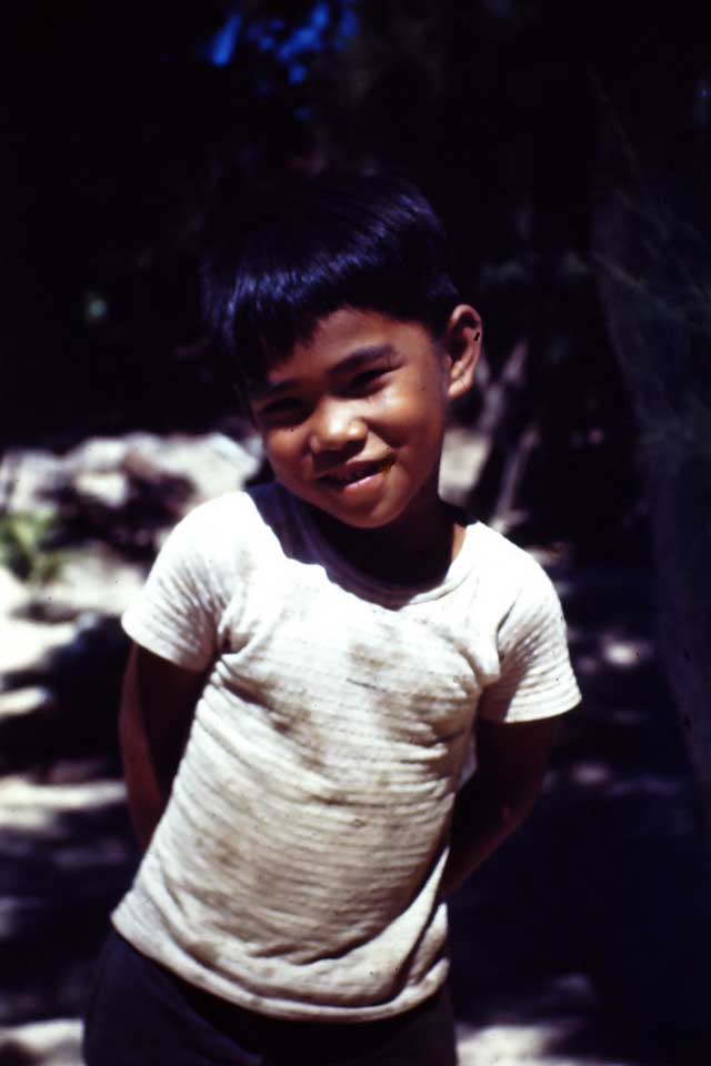 #20 Local boy on Waikiki Beach in Hawaii, 1945