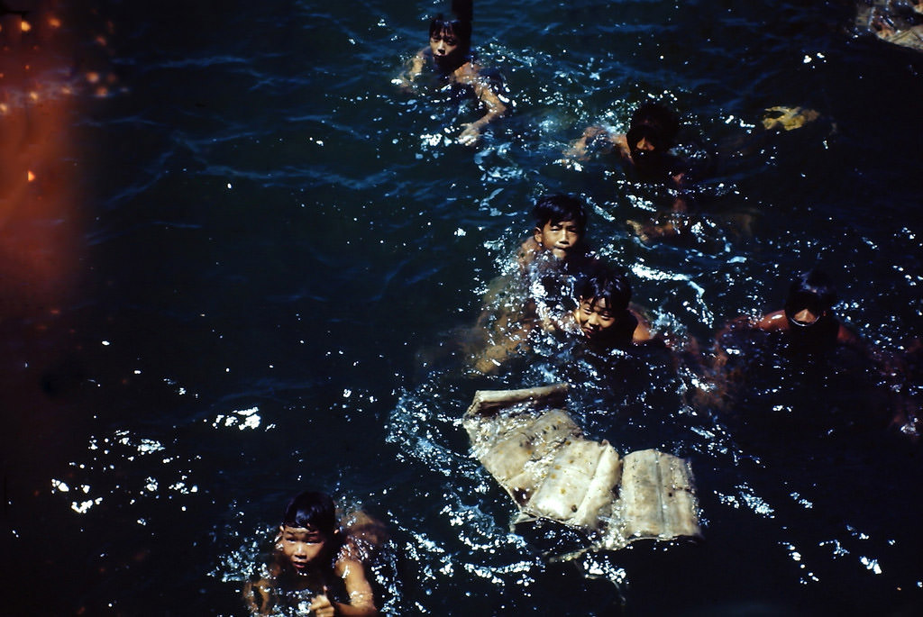 #21 Local boys diving at Waikiki, Hawaii, 1945