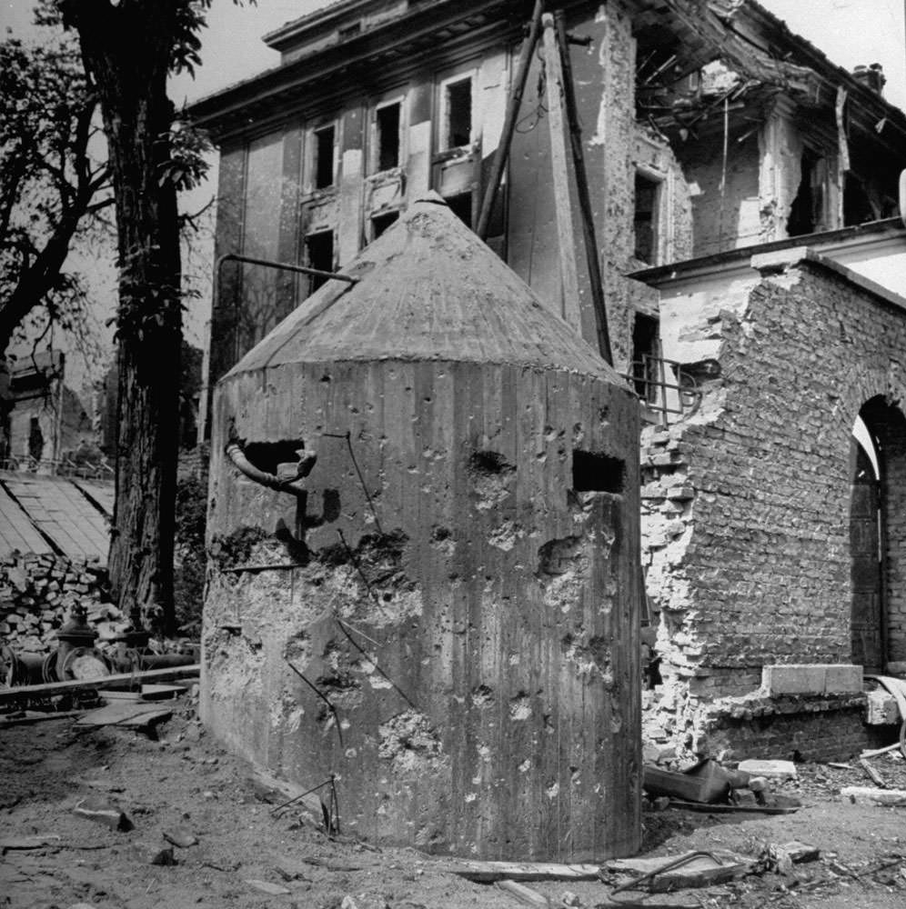 #13 Bullet-riddled sentry pillbox outside Hitler’s bunker, Berlin, 1945.
