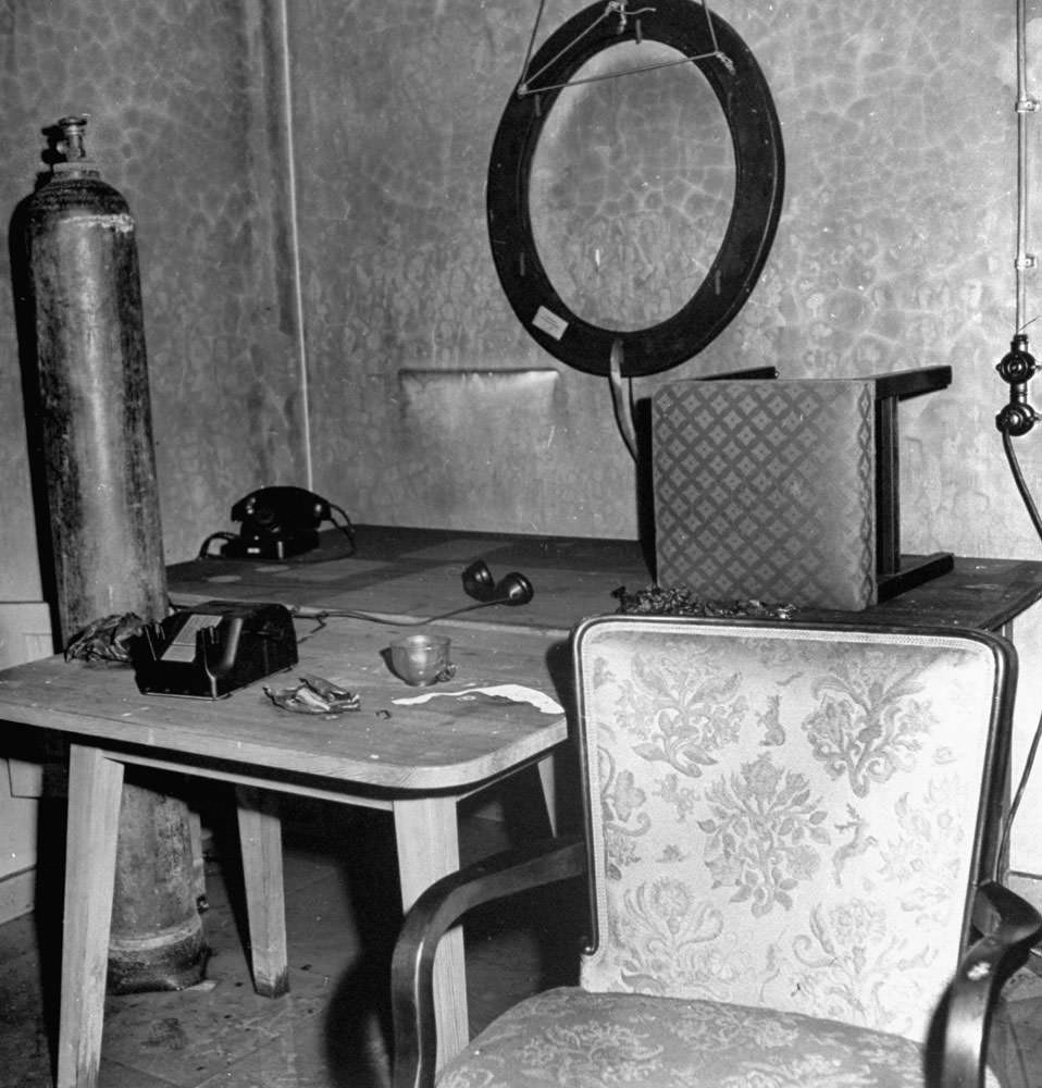 #2 Abandoned furniture and debris inside Adolf Hitler’s bunker, Berlin, 1945.