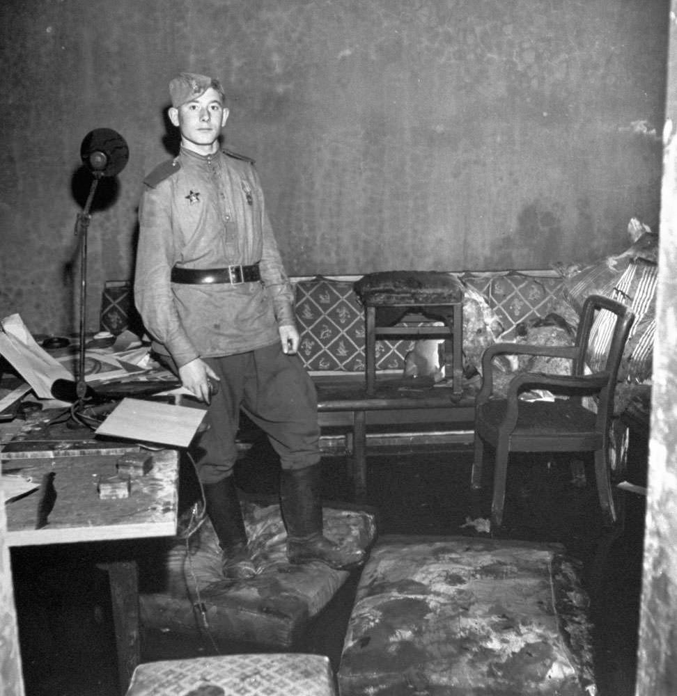 #7 A Russian soldier stands in Adolf Hitler’s bunker, Berlin, 1945.