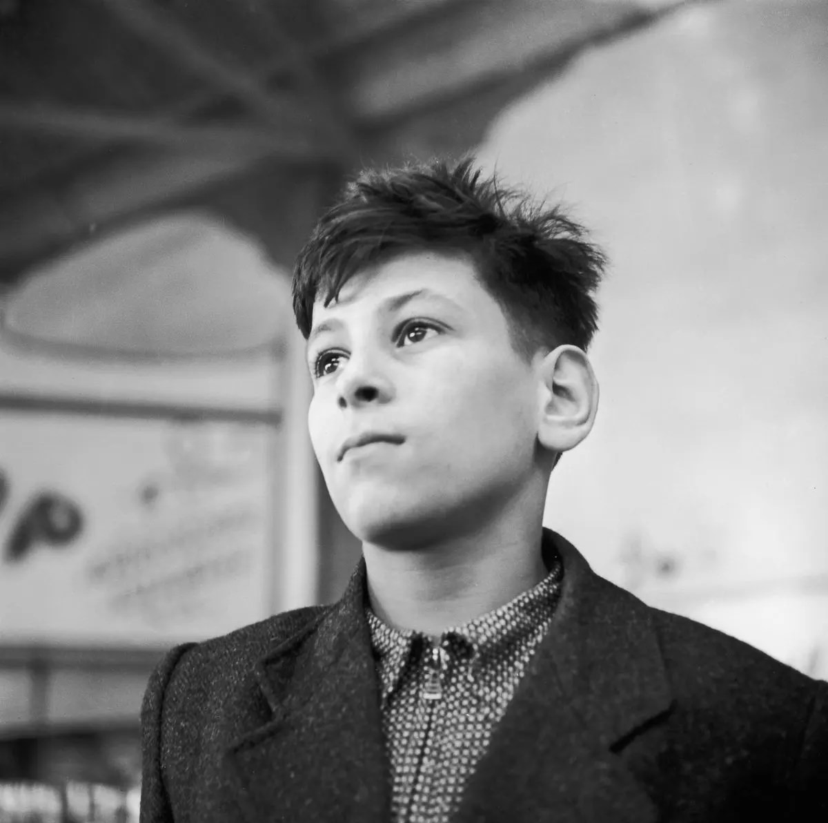 #8 A young refugee arrives at the Dovercourt holiday camp, 1938.