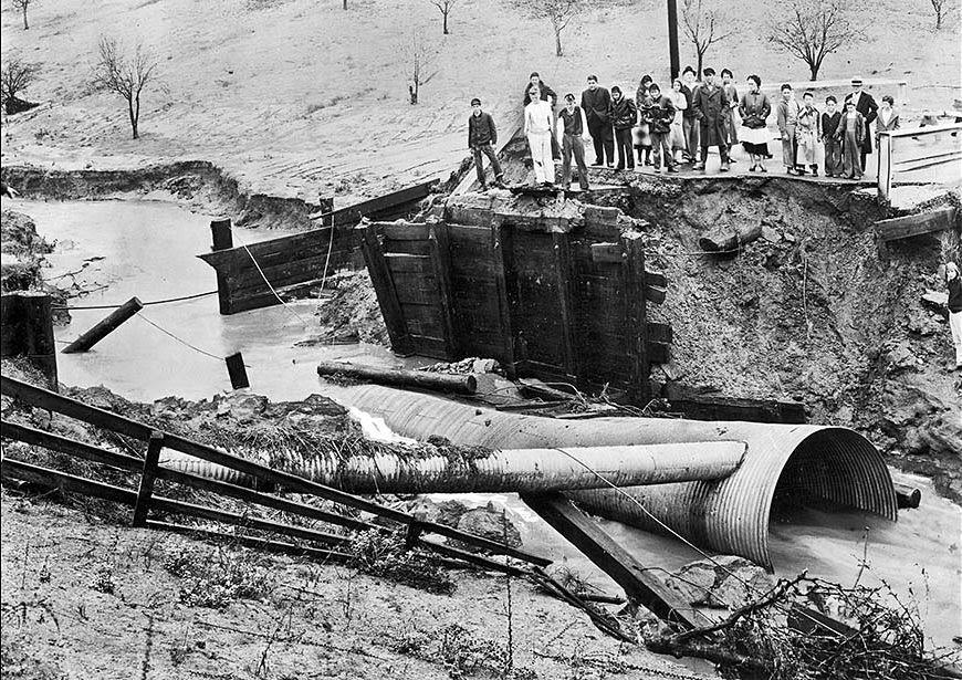 #6 A crowd gathers at the washed-out Mesa Street bridge where four people drowned when their auto plunged into the Rubio Wash, 1934