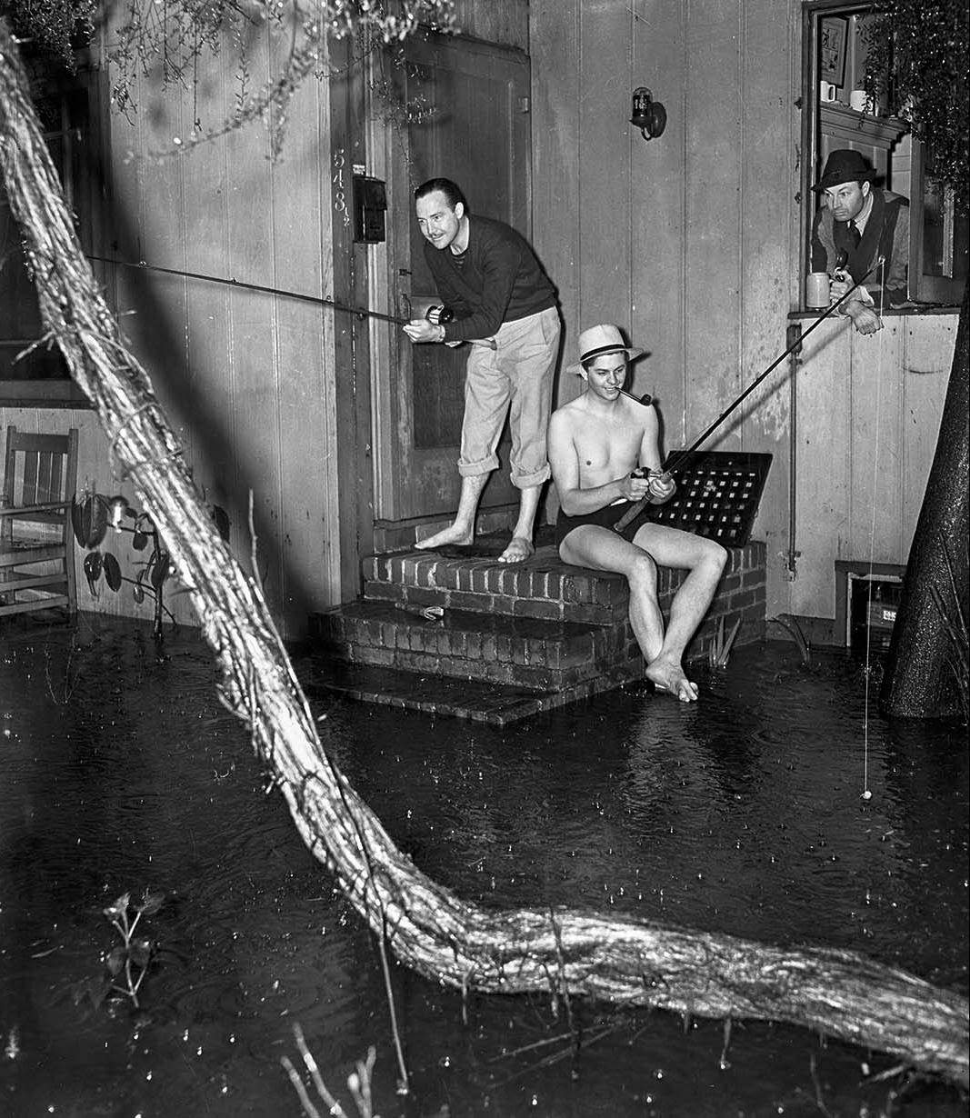 #25 Dr. A. J. Gray, left, Douglas Dawson and Dr. A. G. Hobbs do a little fishing at home on 500 block of South New Hampshire, 1938