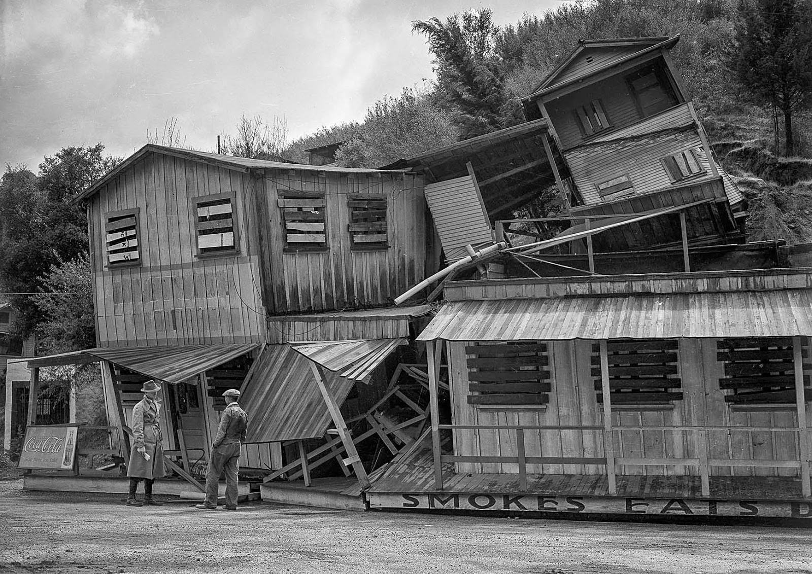 #18 A three-story structure once occupied by cafe at Cheeney Road and Topanga Canyon Road collapsed and toppled into the highway as prolonged rains softened foundations, 1938