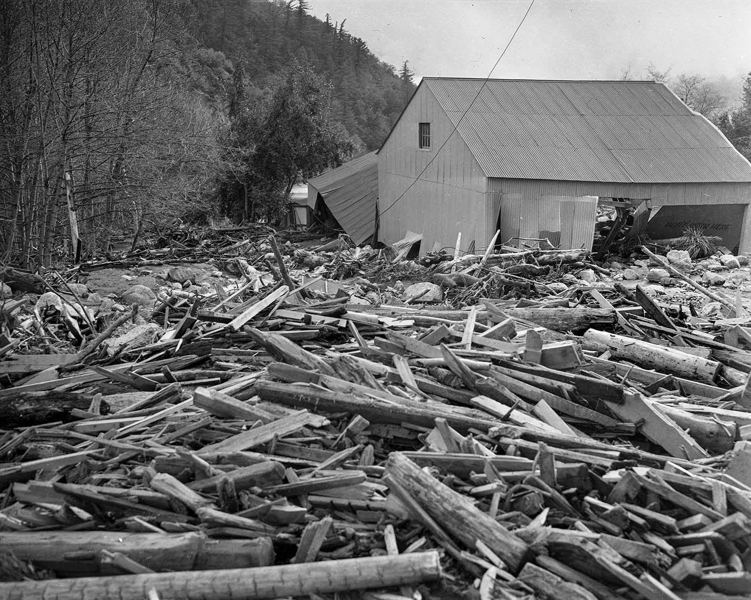 #8 Wreckage piled up in front of the Camp Baldy garage, 1938