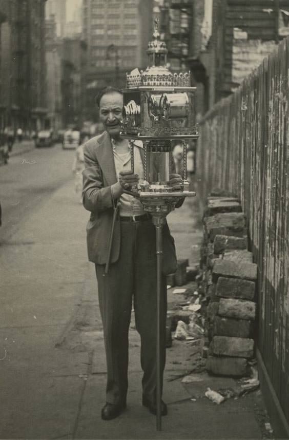 #18 A sidewalk fortune teller near Chatham Square on the Lower East Side, 1947