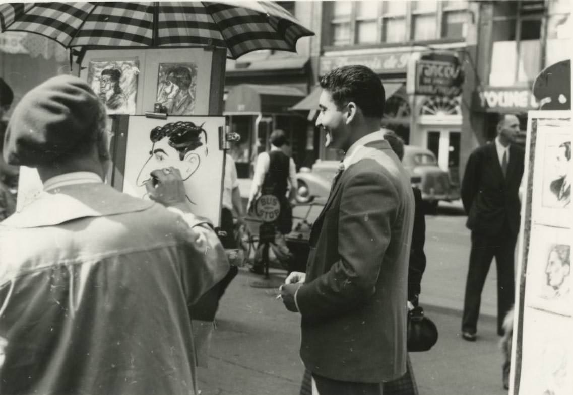 #30 A street artist draws a caricature of a man in Greenwich Village.