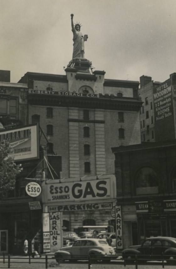 #13 Replica of Statue of Liberty on top of Liberty Storage Company building near Lincoln Center, 1950s
