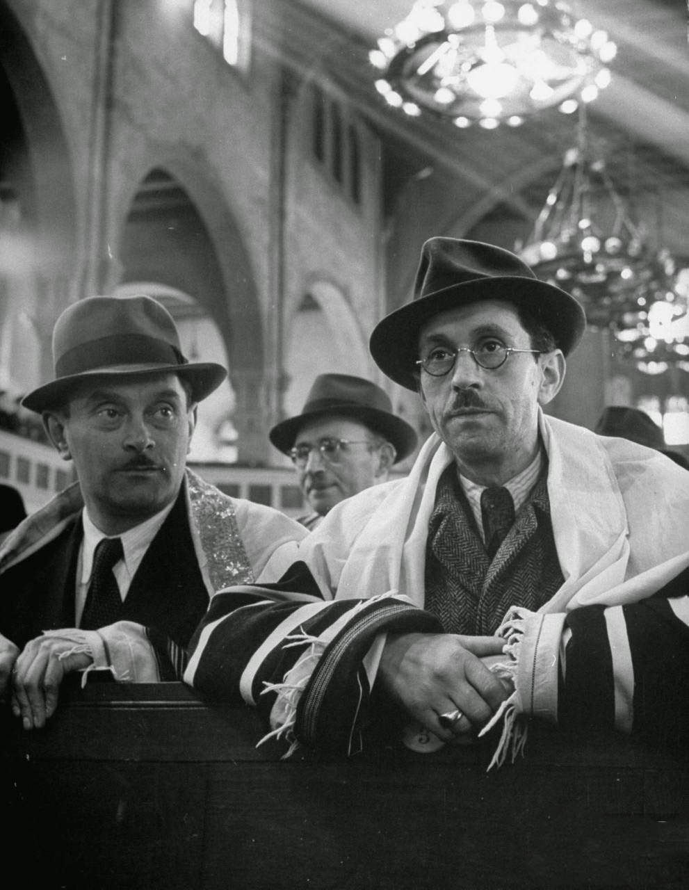 #3 Jewish men attending the synagogue during Passover.