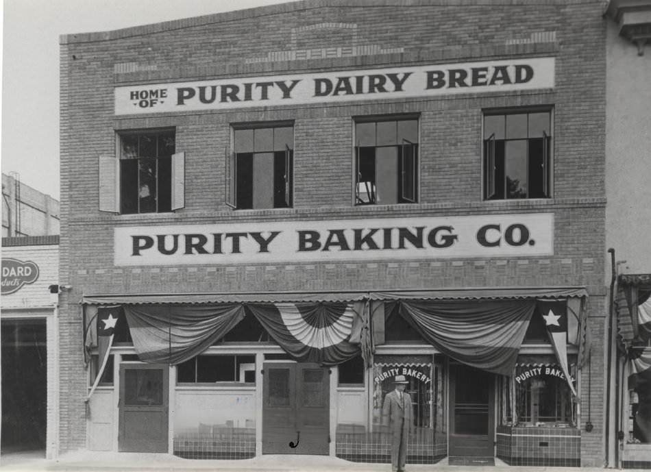#119 Peter Andreucetti in front of the Purity Baking Company building, 1925