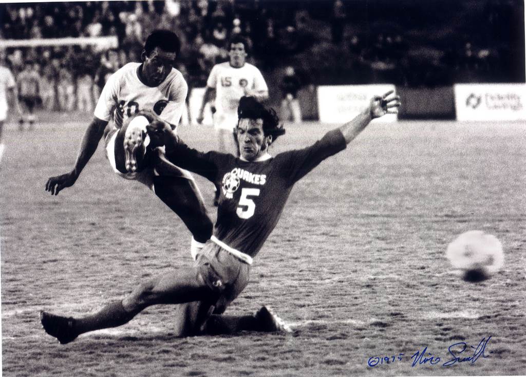 #144 “Gabbo” Gavric slides into Pelé, 1975
