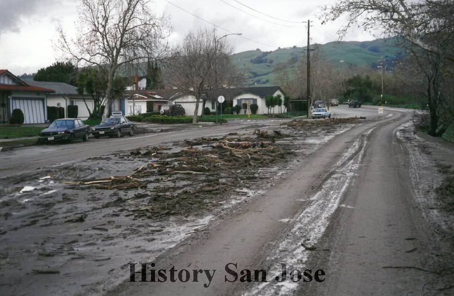 #67 Flood debris on residential street. Possibly the 1998 El Nino Flood in California.