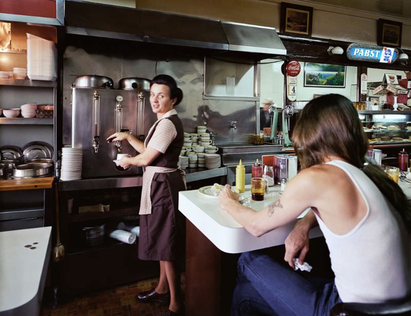 #24 Pat serving coffee at the Gordon Cafe, 7th at Mission Street, 1980