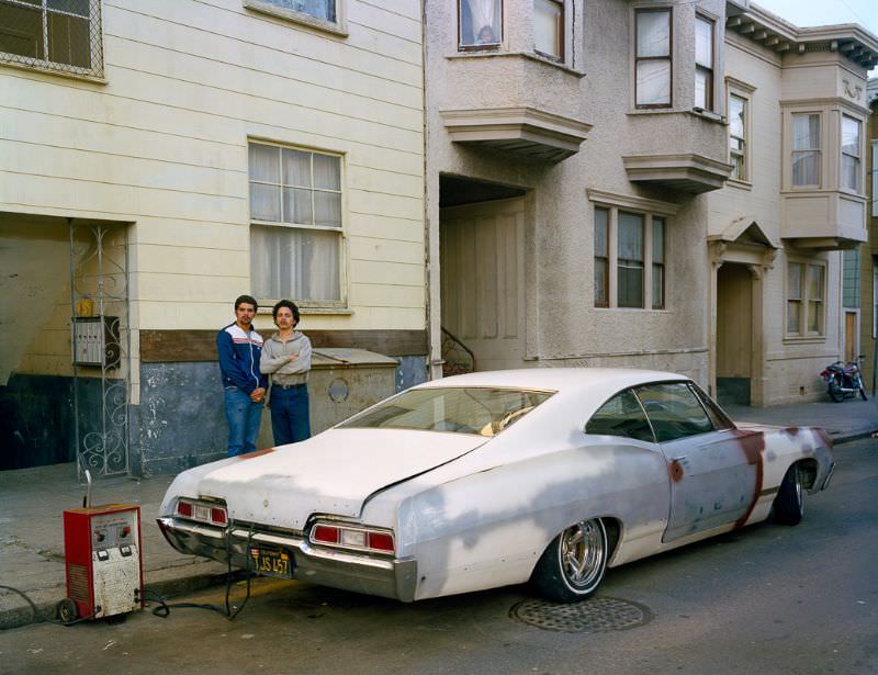 #38 Charging battery, Moss Street, 1982