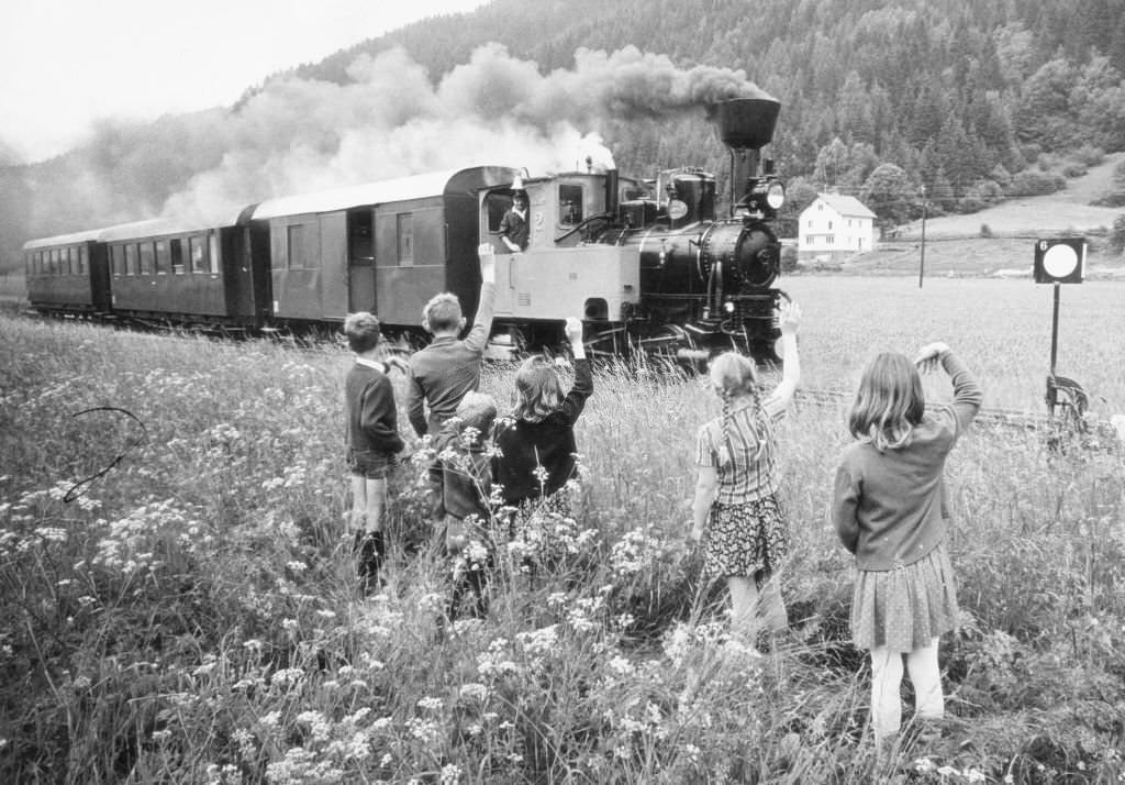 #216 Children wave steam locomotive, 1970s