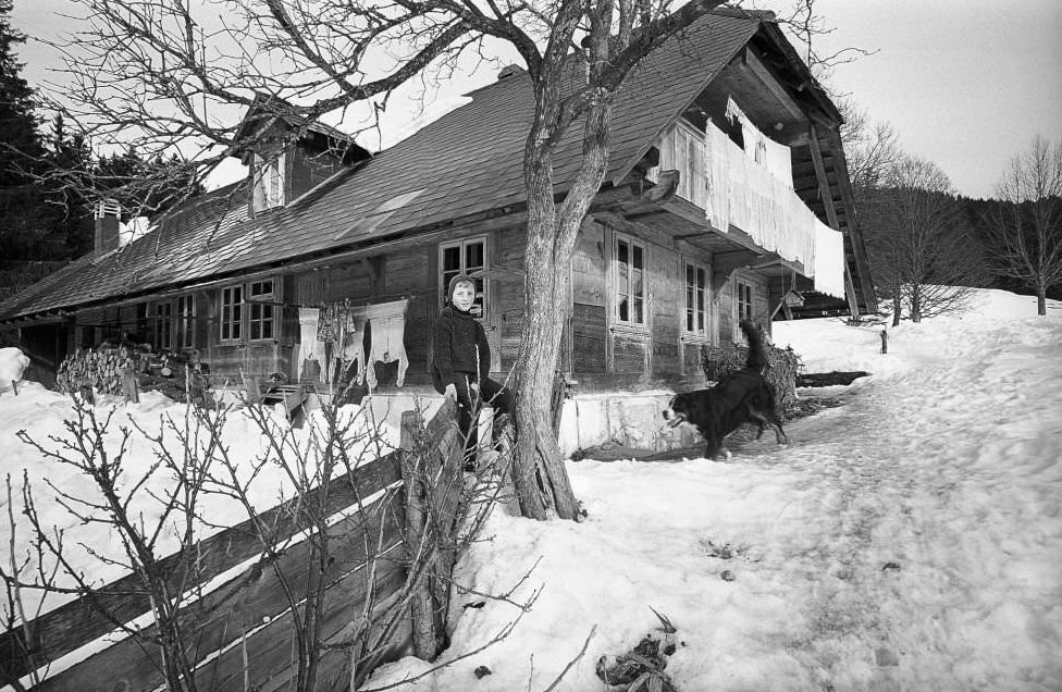 #49 Boy in front of a farmhouse in the Emmental, 1970