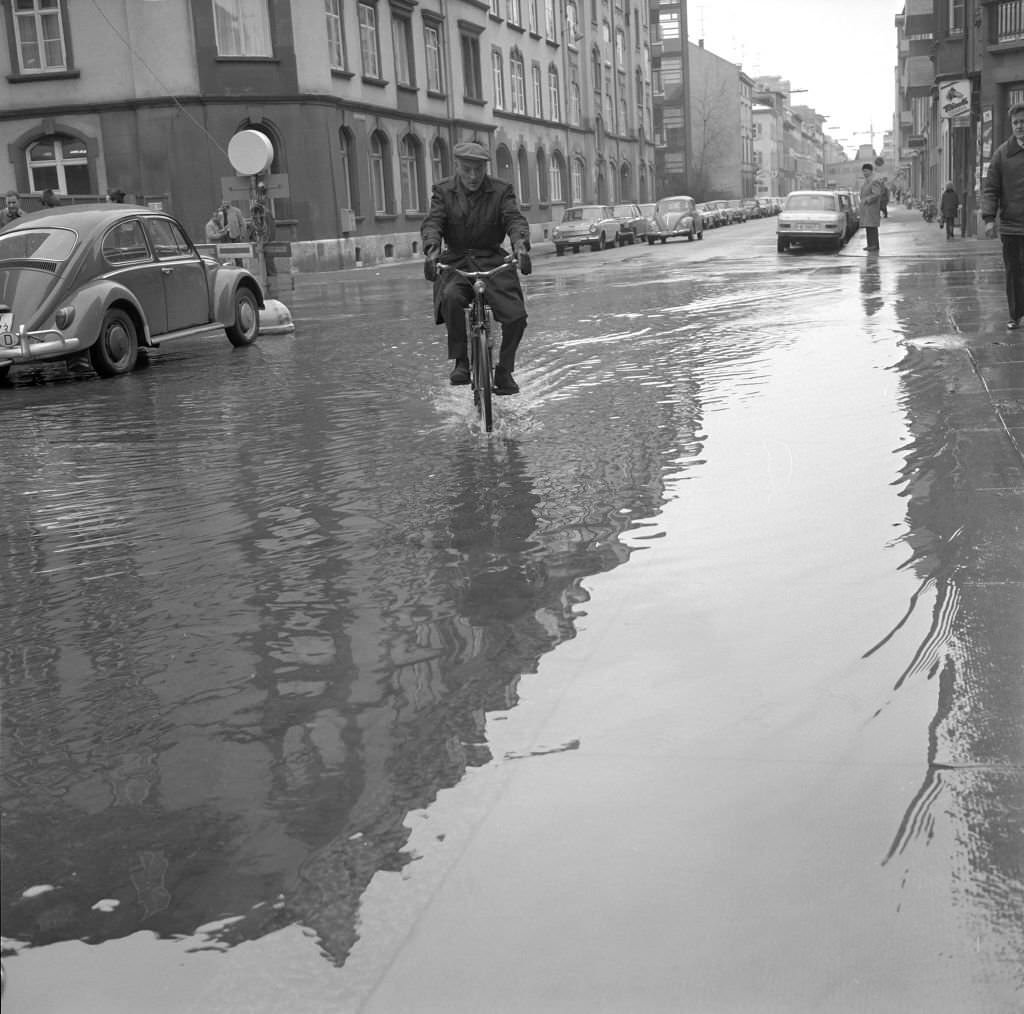 #70 Flooded street in Basle after pipe burst, 1970