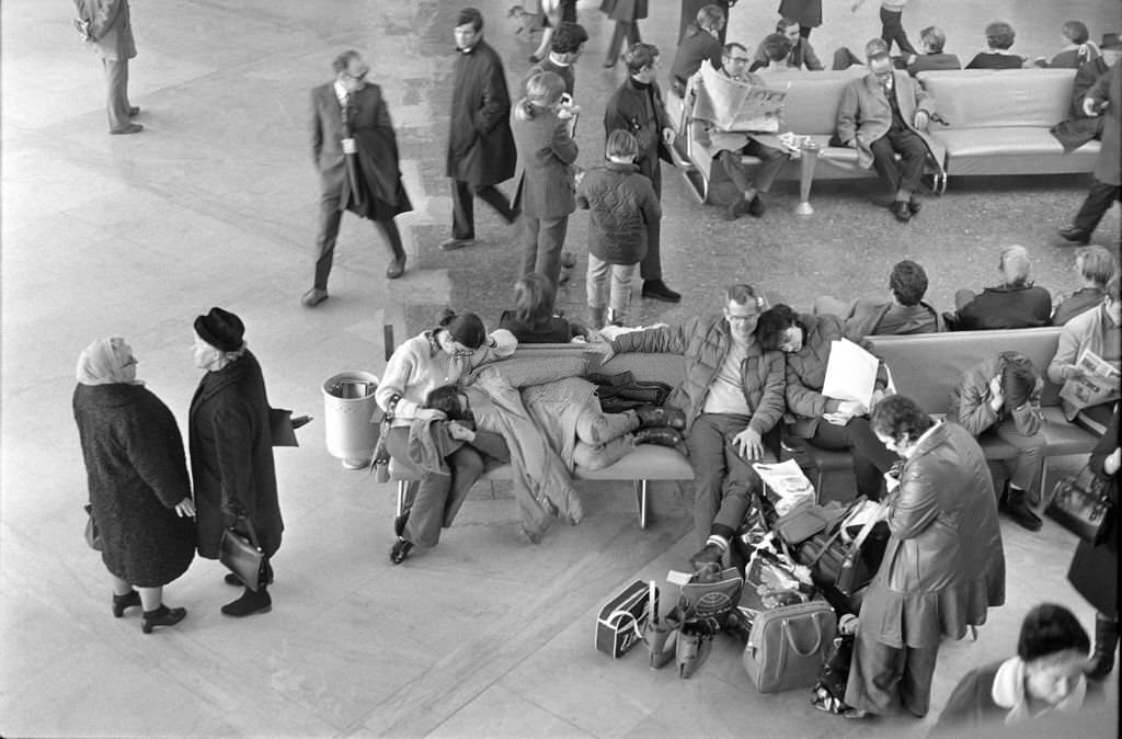 #77 People at Zurich-Kloten airport, 1970