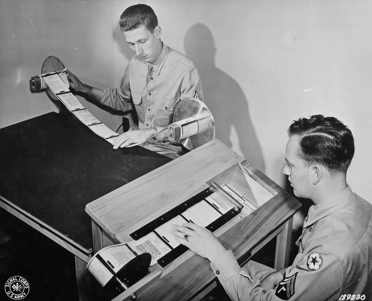 #10 Paper reproductions of V-mail microfilm are inspected and then cut into individual letters by a “chopper.”