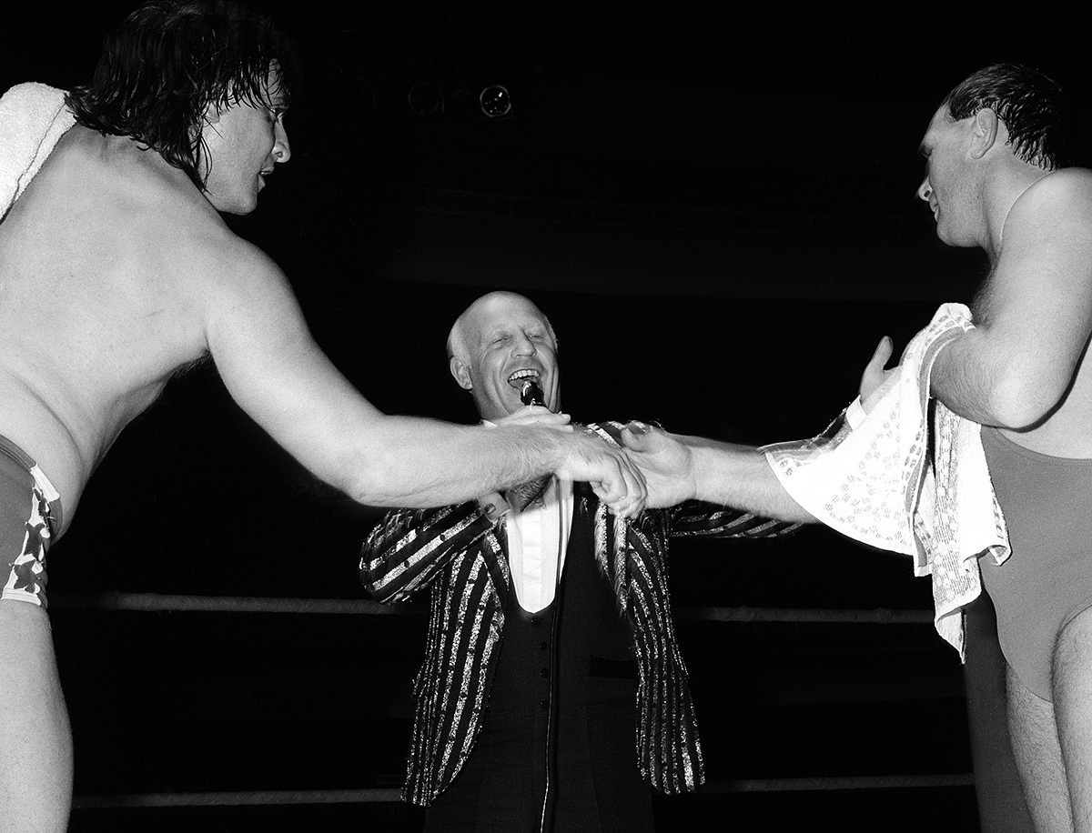 #9 Steve Casey, left, and Marty Jones. MC Brian Crabtree, center. Spa Royal Hall, Bridlington.