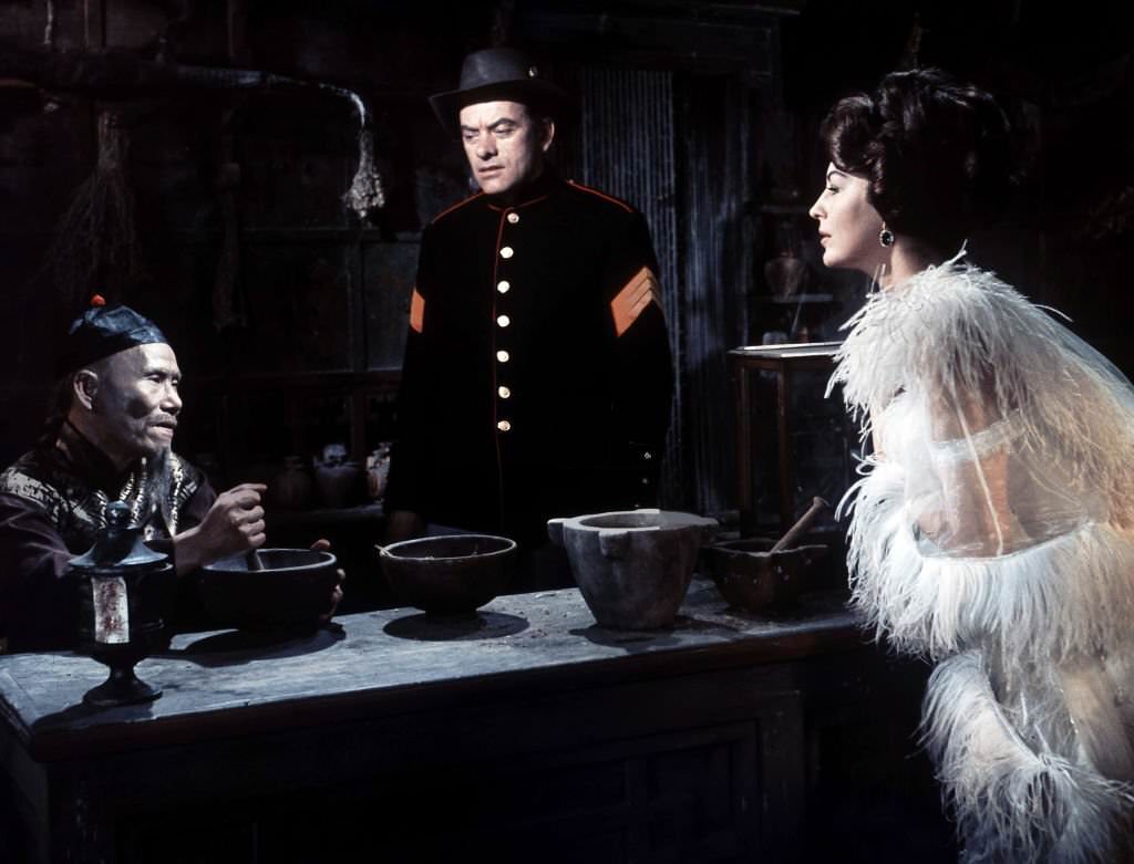 Charlton Heston and Ava Gardner in a scene from the film ’55 Days At Peking’, 1963.