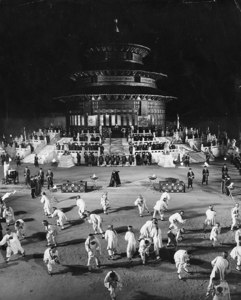 Robert Helpmann as Prince Tuan conducting the Boxer Induction Ceremony in the courtyard of the Temple of Heaven for the Dowager Empress Tsu Hsi in a scene from Samuel Bronston’s ’55 Days At Peking’, 1963