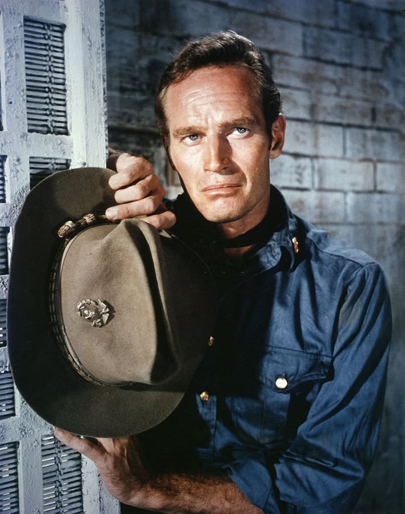 American actor Charlton Heston on the set of ’55 Days at Peking’, 1963