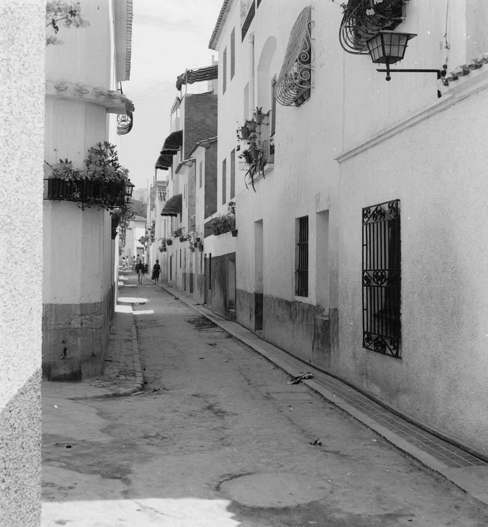#11 A street at Benidorm, southern Spain, 1963