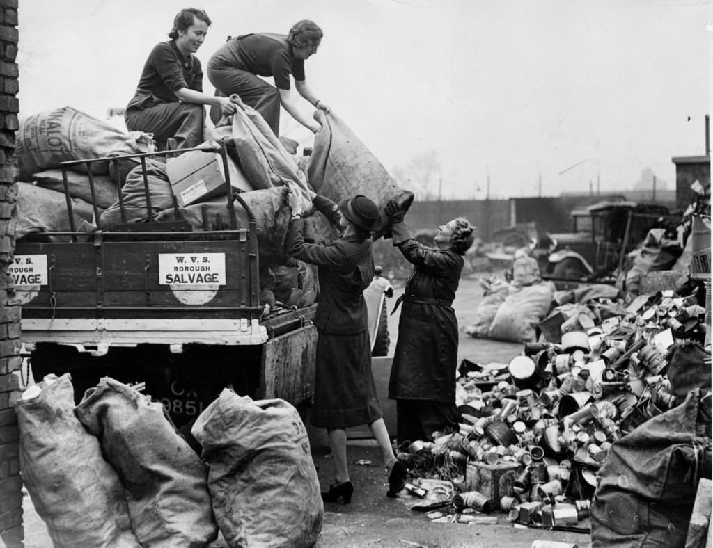 #130 The WVS (Women’s Voluntary Service) unloading salvage at a depot where it is to be sorted, 1941