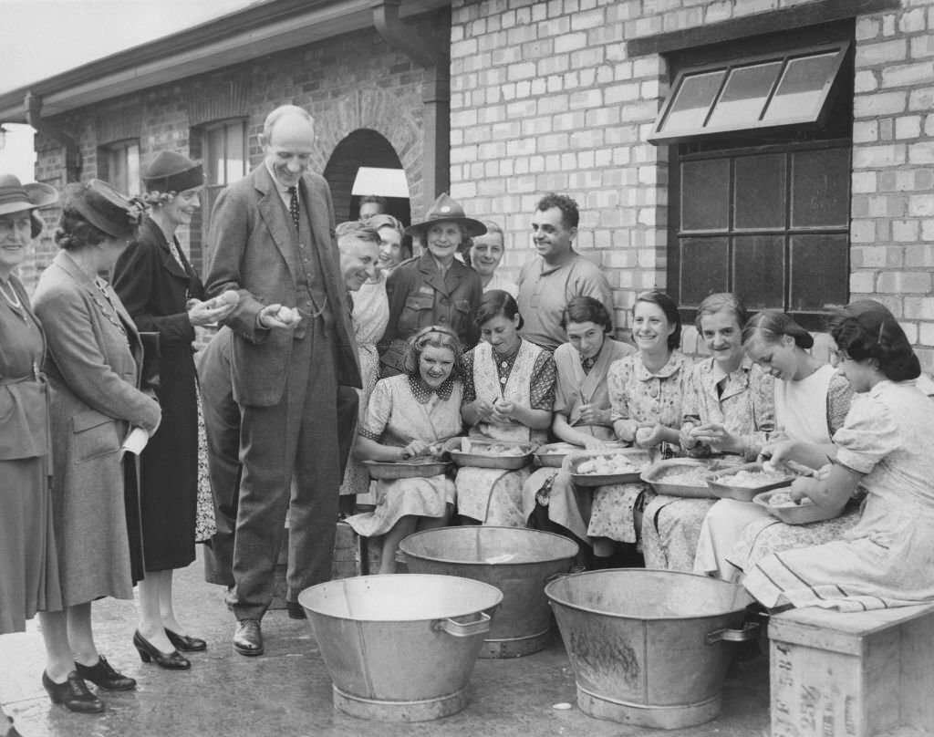#144 Women Peeling Potatoes for soldiers, 1941