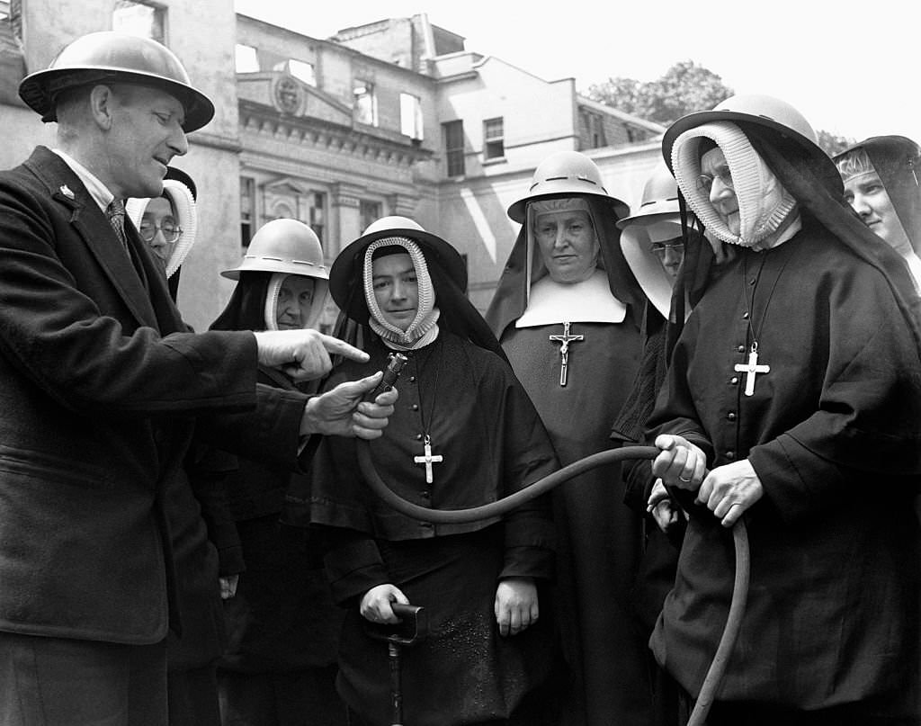 #35 Nuns receiving fire drill instruction in the UK during World War II, 1939